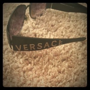 A pair of Versace unisex-adult sunglasses